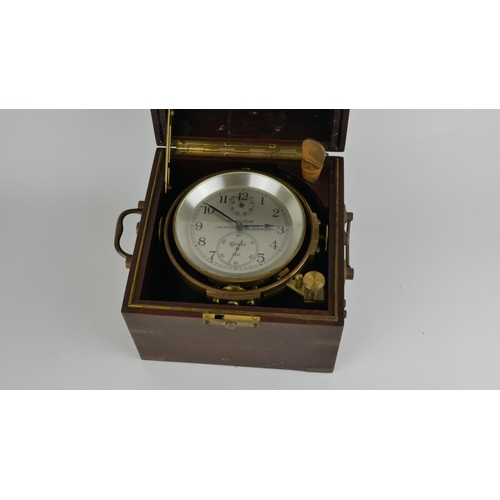 423 - HAMILTON WATCH CO., AN AMERICAN WWII MARINE CHRONOMETER  
The silver tone dial having a subsidiary d... 