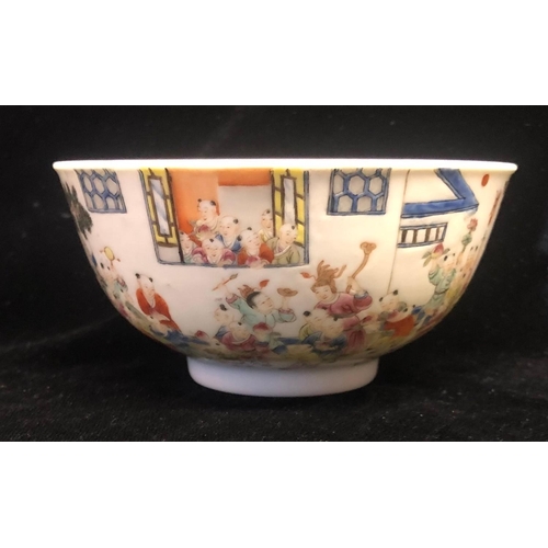 425A - A CHINESE FAMILLE ROSE THOUSAND BOYS DECORATED BOWL, bearing a Qing dynasty mark. Diameter 11.4 x H ... 