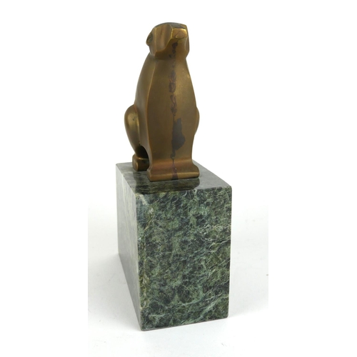 426 - AN ART DECO BRONZE SCULPTURE OF A POLAR BEAR
having square form features, on a green marble plinth.
... 