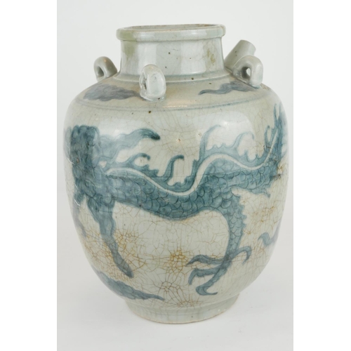 428A - A CHINESE PROVINCIAL MING PERIOD RICE WINE JUG
Decorated with a four toe dragon on a pale blue groun... 