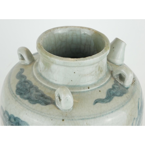 428A - A CHINESE PROVINCIAL MING PERIOD RICE WINE JUG
Decorated with a four toe dragon on a pale blue groun... 