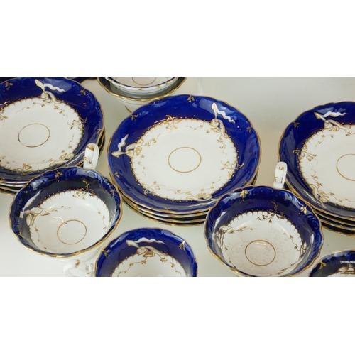 432A - WITHDRAWN
AN EARLY 19TH CENTURY ENGLISH PORCELAIN TEA SERVICE
Having a wide Royal blue border with g... 