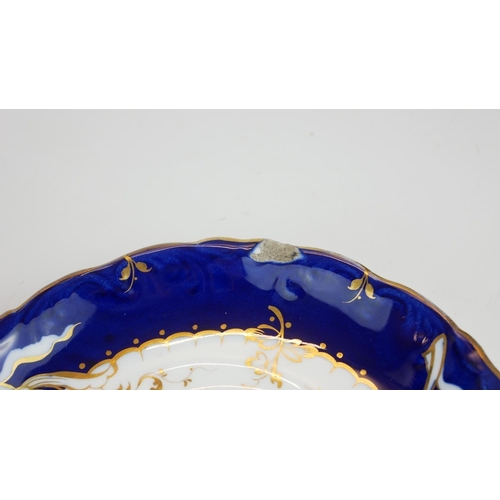 432A - WITHDRAWN
AN EARLY 19TH CENTURY ENGLISH PORCELAIN TEA SERVICE
Having a wide Royal blue border with g... 