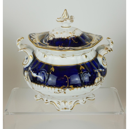 432A - WITHDRAWN
AN EARLY 19TH CENTURY ENGLISH PORCELAIN TEA SERVICE
Having a wide Royal blue border with g... 