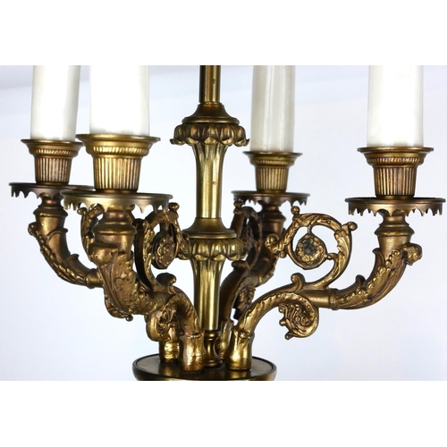 434A - A PAIR OF LARGE CONTINENTAL BRASS AND BISQUE FOUR BRANCH TABLE LAMPS
The bodies with relief decorati... 