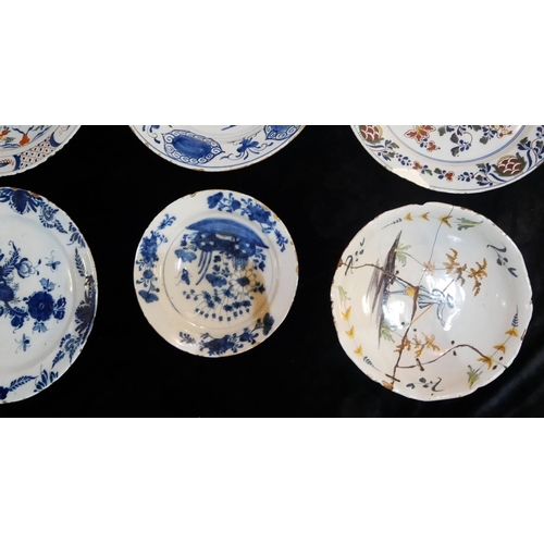 451 - DELFTWARE, A COLLECTION OF SIX LARGE 18TH CENTURY CHARGERS/DISHES
Having underglaze blue decoration ... 