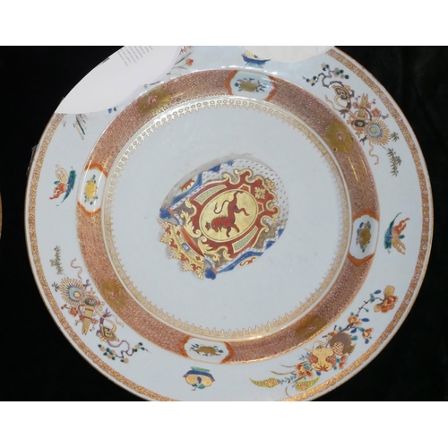 452 - A SET OF FOUR LARGE 18TH CENTURY CHINESE ARMORIAL PORCELAIN CHARGER DISHES
Each having a family cres... 