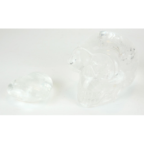 456A - A CARVED AND POLISHED ROCK CRYSTAL SCULPTURE OF A HUMAN SKULL
Along with a rock crystal heart.
(larg... 