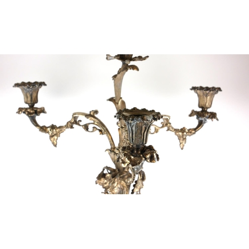 459 - A LARGE 20TH CENTURY SILVER PLATED CANDELABRA
Having four organic form branches, on scrolled tripod ... 