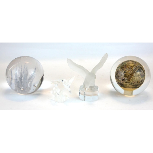 460A - TWO LARGE GLASS DESK PAPERWEIGHTS
Along with a Goebel crystal eagle, a crystal hummingbird and a cry... 