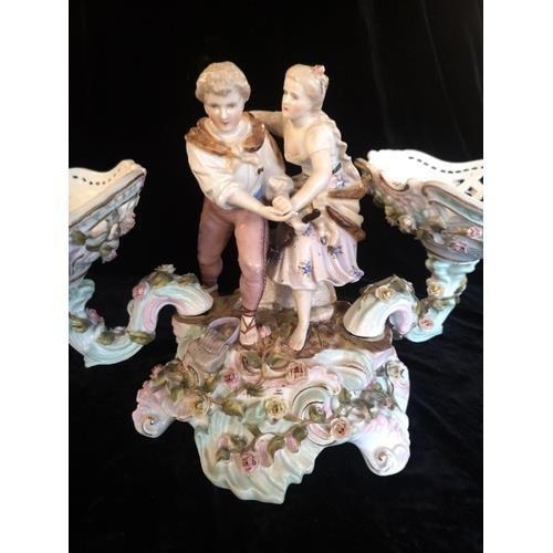 461A - THURINGIAN, SITZENDORF, A LATE 19TH CENTURY PORCELAIN CENTRE TABLE, PASTORAL GROUP
Young couple rais... 