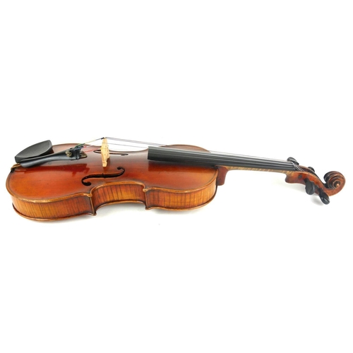 464 - A 19TH CENTURY HALF SIZE VIOLIN WITH STAMPED LASALLE BOW
Contained in a wooden sarcophagus case.