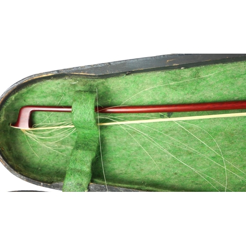 464 - A 19TH CENTURY HALF SIZE VIOLIN WITH STAMPED LASALLE BOW
Contained in a wooden sarcophagus case.