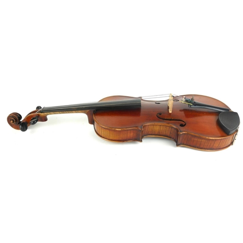 464 - A 19TH CENTURY HALF SIZE VIOLIN WITH STAMPED LASALLE BOW
Contained in a wooden sarcophagus case.