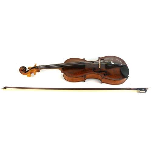 467 - A LATE 18TH CENTURY VIOLIN
With mother of pearl inlaid tailpiece the bow, stamped 'Germany', wooden ... 