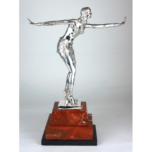 473A - AN ART DECO STYLE SILVERED BRONZE STATUE
Dancing girl in Egyptian dress, on rouge marble base.
(48cm... 