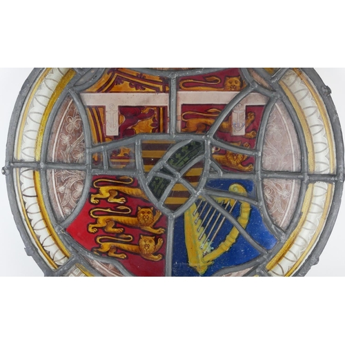 483A - A VICTORIAN STAINED GLASS ROUNDEL
Hand finished with three lions and harp to shield, with ‘Duke of E... 