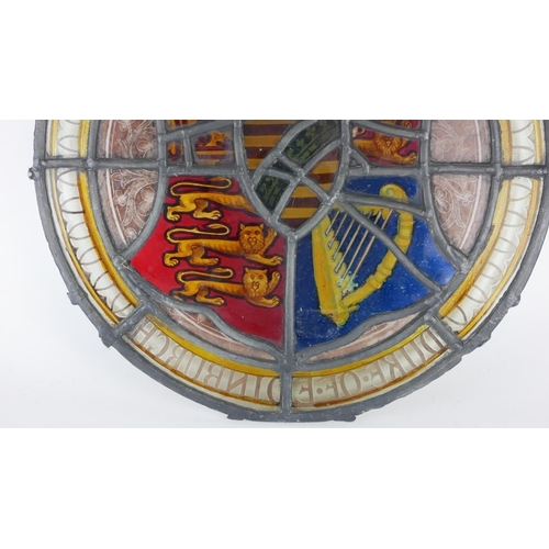 483A - A VICTORIAN STAINED GLASS ROUNDEL
Hand finished with three lions and harp to shield, with ‘Duke of E... 