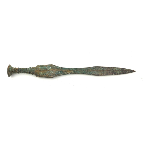 488 - A CHINESE ARCHAIC DESIGN BRONZE DAGGER
Having a twist form grip. 
(approx 35cm)