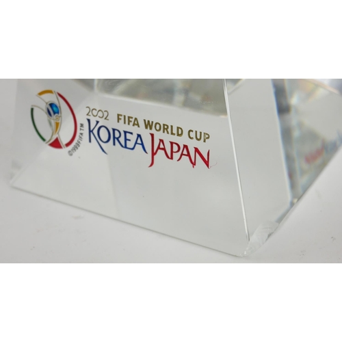 493a - A 2002 GLASS KOREA WORLD CUP FOOTBALL TROPHY AND STAND
Full size, marked ‘2002 Fifa World Cup Korea ... 