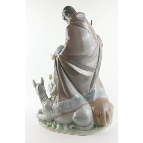 499 - LLADRO, A LARGE  PORCELAIN NATIVITY GROUP FIGURE
Titled 'Joyful Event', impressed number ‘6008’.
(ap... 