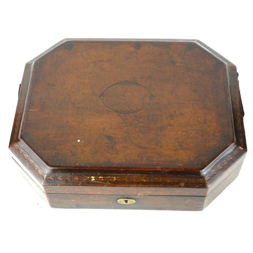 500A - A VINTAGE LEATHER CLAD OCTAGONAL JEWELLERY BOX
With tooled gilt decoration, velvet lined interior an... 