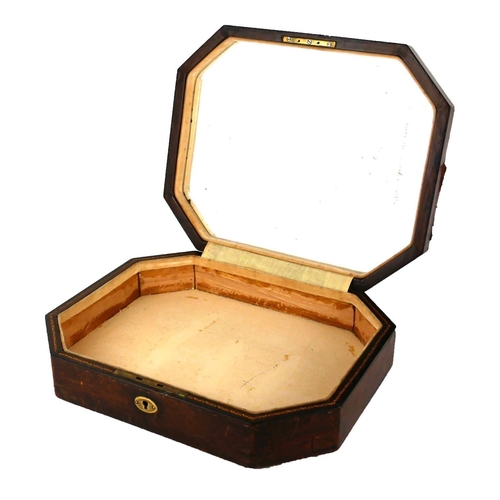 500A - A VINTAGE LEATHER CLAD OCTAGONAL JEWELLERY BOX
With tooled gilt decoration, velvet lined interior an... 