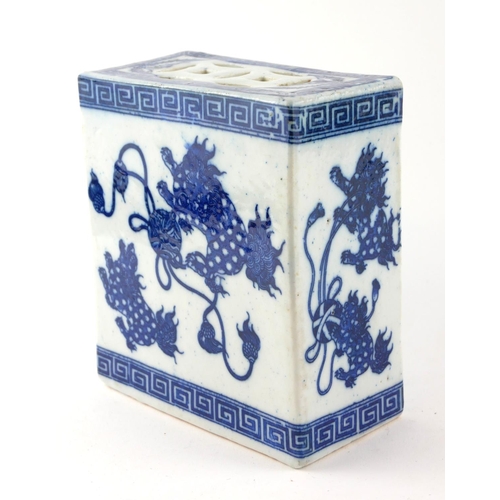 517 - A CHINESE BLUE AND WHITE PORCELAIN FLOWER BRICK
Decorated with Kylins at play. 
(approx 13cm x 15cm)