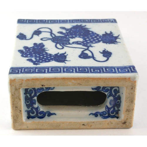 517 - A CHINESE BLUE AND WHITE PORCELAIN FLOWER BRICK
Decorated with Kylins at play. 
(approx 13cm x 15cm)