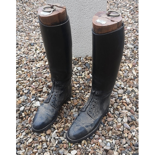 534 - A PAIR OF BLACK LEATHER RIDING BOOTS WITH WOODEN TREES
Bearing label ‘Green Street Military and Hunt... 