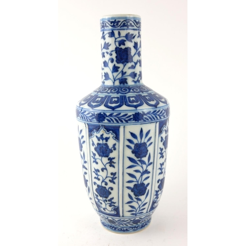 535 - A CHINESE PORCELAIN BLUE AND WHITE VASE
With fluted panels and hand painted floral decoration, beari... 