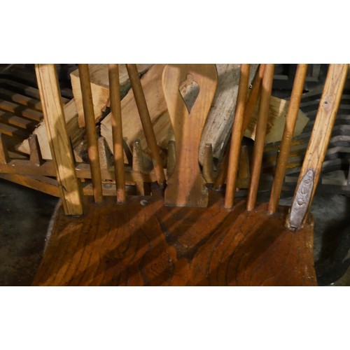 834 - A SET OF FOUR 19TH CENTURY ASH AND ELM WINDSOR CHAIRS
Including one carver.