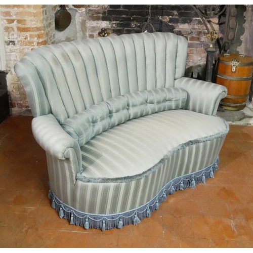 832 - AN ART DECO DESIGN KIDNEY FORM TWO SEATER WINDOW SETTEE
With shell back, in pale green fabric uphols... 