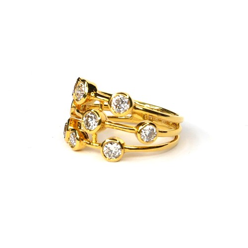 237A - A 14CT GOLD AND DIAMOND CLUSTER RING
The arrangement of round cut stones, marked (size O).
(approx t... 