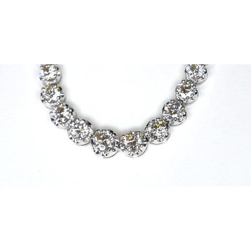 237 - AN 18CT WHITE GOLD AND DIAMOND NECKLACE
Having a single row of graduating round cut diamonds. 
(appr... 