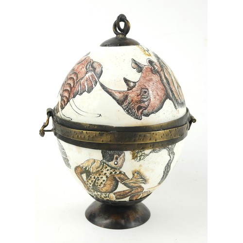 173a - AN OSTRICH EGG
Decorated with the big five: rhinoceros, lion, buffalo, leopard and elephant.
(20cm)