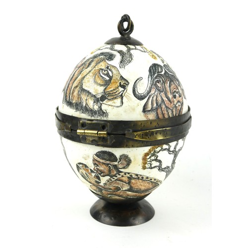 173a - AN OSTRICH EGG
Decorated with the big five: rhinoceros, lion, buffalo, leopard and elephant.
(20cm)