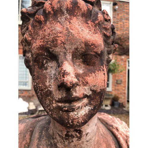 476 - A HALF LIFE SIZE RED CLAY BUST OF A ROMAN FEMALE 
On a stepped base.
(63cm)