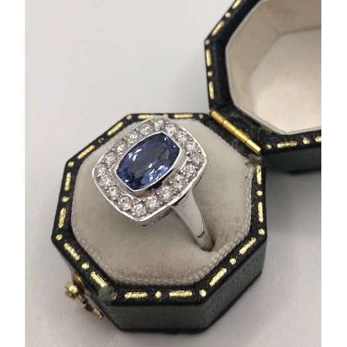 326A - AN 18CT WHITE GOLD ART DECO STYLE RING
set with 1.50ct sapphire surrounded by .55ct diamonds
size O