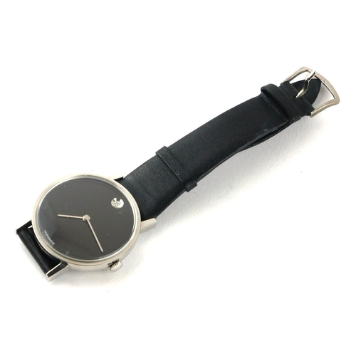 118A - MOVADO, A VINTAGE STAINLESS STEEL GENTS WRISTWATCH
Having a black tone dial with calendar window, on... 