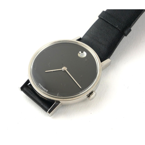 118A - MOVADO, A VINTAGE STAINLESS STEEL GENTS WRISTWATCH
Having a black tone dial with calendar window, on... 