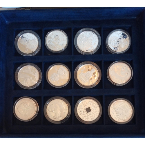 123 - THIRTY SILVER CHINESE PROOF COINS
including sixteen 1oz 10 Yuan coins and fourteen five Yuan coins, ... 