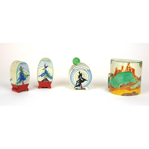 224 - CLARICE CLIFF, BIZARRE RANGE, AN UNUSUAL ART DECO COMPLETE THREE PIECE BONJOUR CRUET SET
In ‘Pine Gr... 