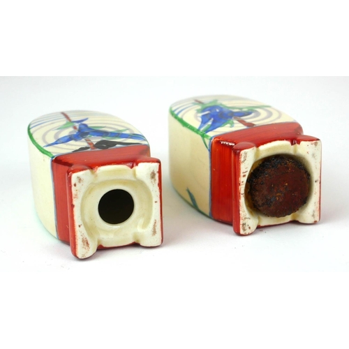 224 - CLARICE CLIFF, BIZARRE RANGE, AN UNUSUAL ART DECO COMPLETE THREE PIECE BONJOUR CRUET SET
In ‘Pine Gr... 