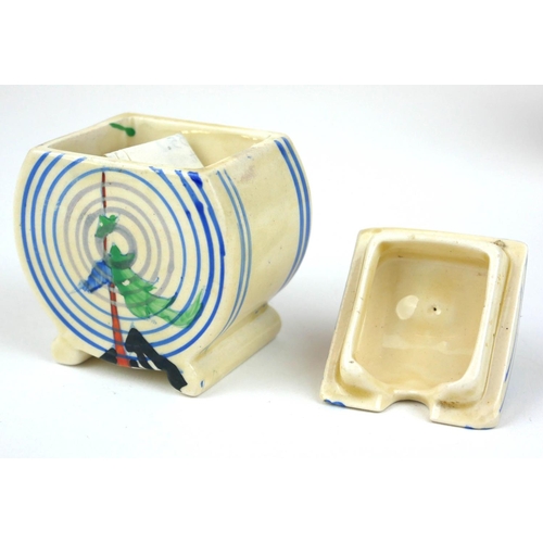 224 - CLARICE CLIFF, BIZARRE RANGE, AN UNUSUAL ART DECO COMPLETE THREE PIECE BONJOUR CRUET SET
In ‘Pine Gr... 