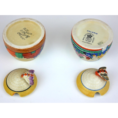 226 - CLARICE CLIFF, BIZARRE RANGE, A SMALL BEEHIVE HONEY POT AND COVER
In ‘Gayday Pattern’, painted in co... 