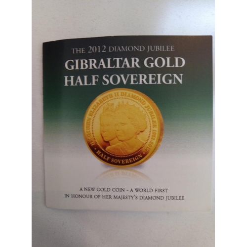 65 - A 22CT GOLD HALF SOVEREIGN PROOF COIN, DATED 2012
Diamond Jubilee Gibraltar gold half sovereign, in ... 