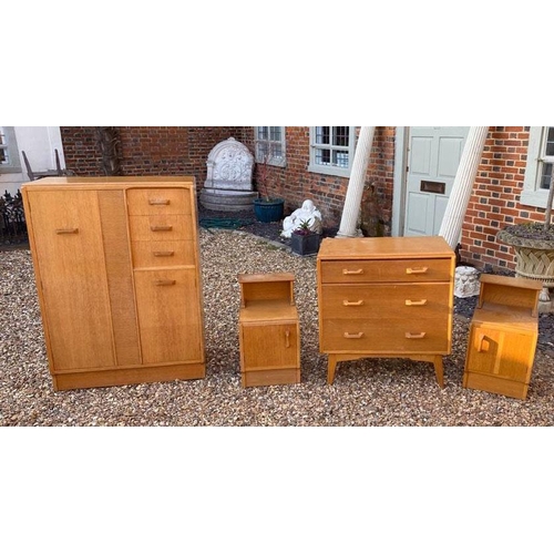 667 - G PLAN, A VINTAGE TEAK FOUR PIECE BEDROOM SUITE
Comprising a compactum wardrobe with fitted mirrored... 