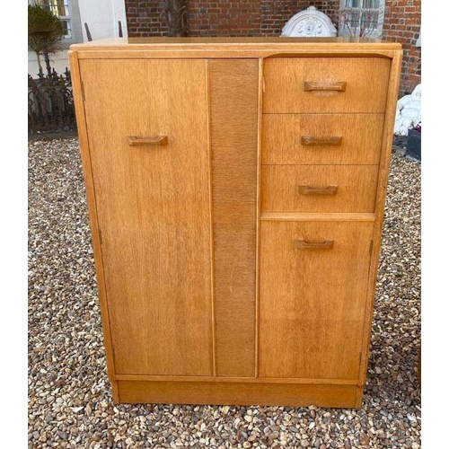 667 - G PLAN, A VINTAGE TEAK FOUR PIECE BEDROOM SUITE
Comprising a compactum wardrobe with fitted mirrored... 