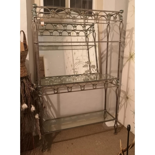 670 - A POLISHED STEEL AND GLASS FLOOR-STANDING SET OF OPEN SHELVES
With art galleries segmented with flor... 